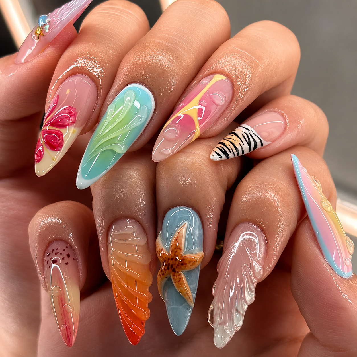 Acrylic gives a nail artist freedom to sculpt shape, length and 3D art.
